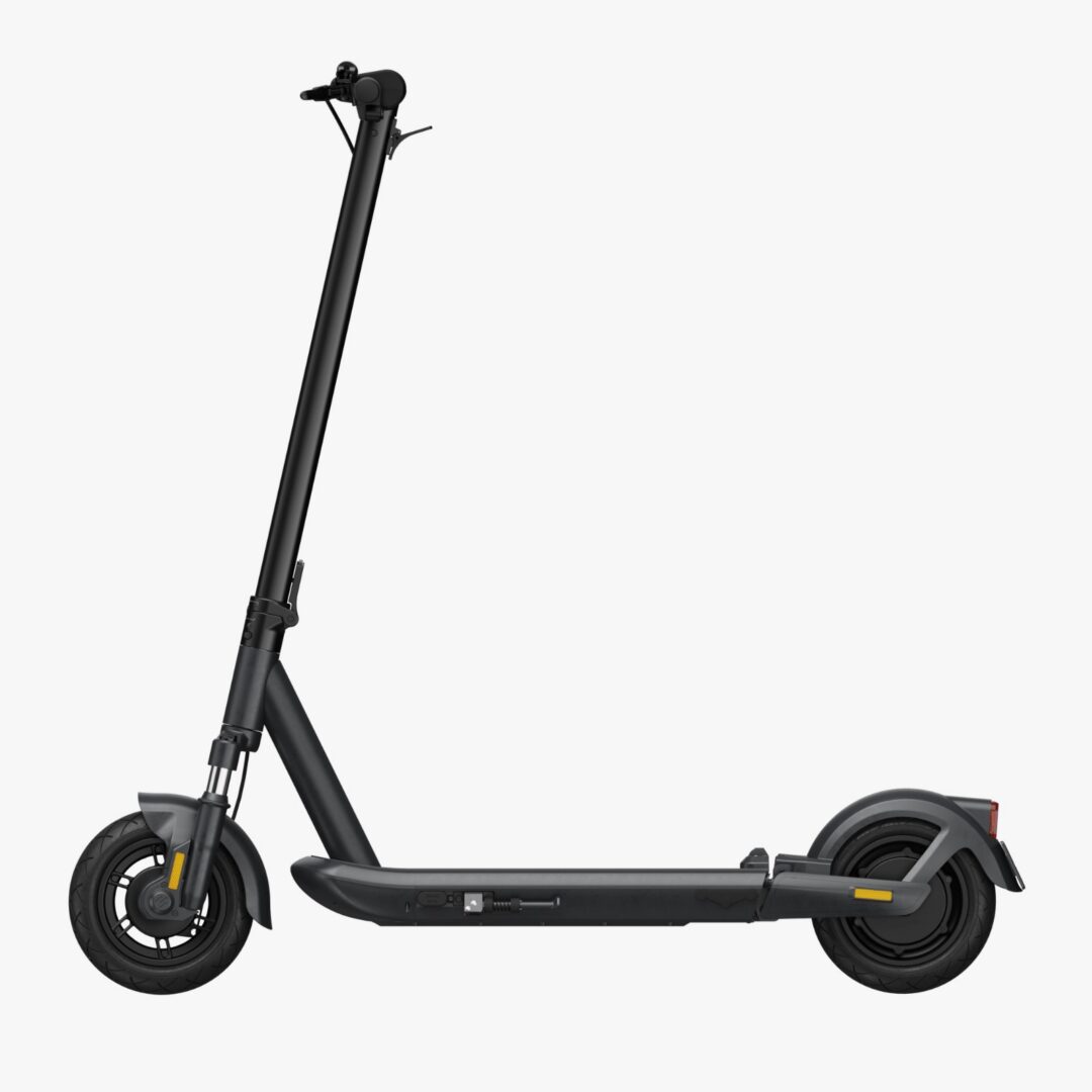 Black electric scooter side view on white